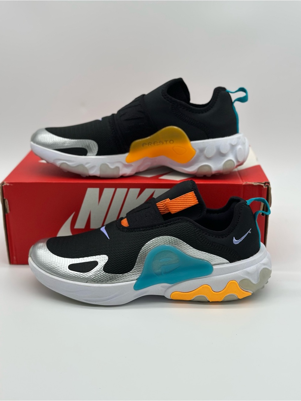 Nike Kids Black Silver Slip-On Sneakers with Orange, Teal & Yellow Accents